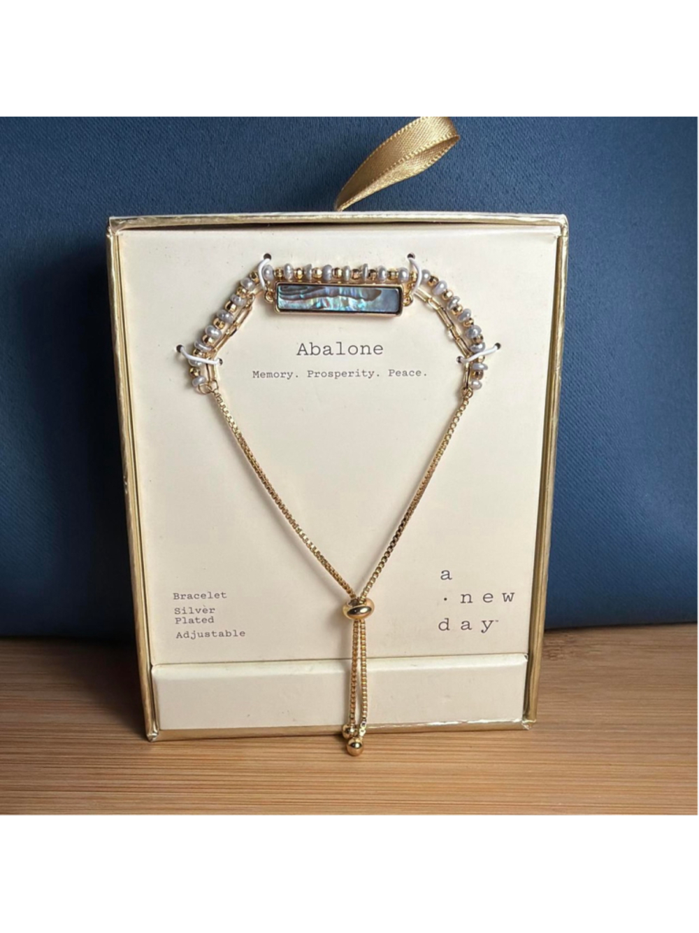 A New Day Abalone bracelet with pearl and gold-tone accents